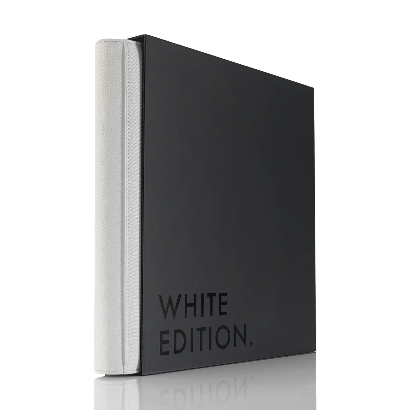 Black notebook with 'White Edition' text on a white background