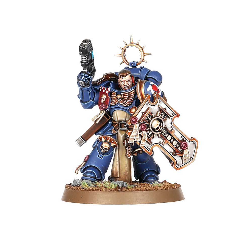 Warhammer figurine with blue armor and weapon on a white background